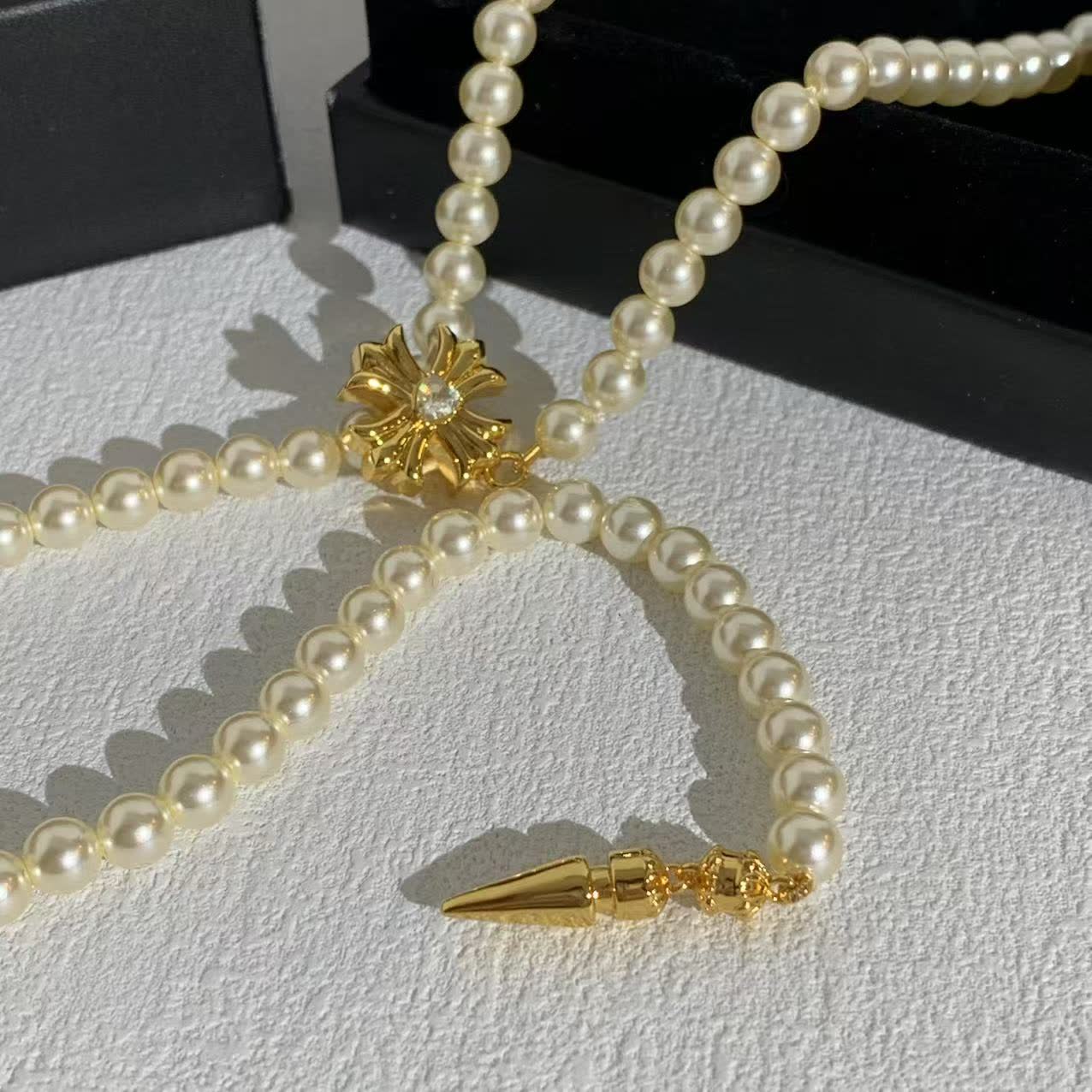 Chrome Hearts Elegant Pearl Necklace with Gold Clasp